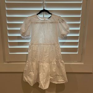 backless summer dress, never worn. price tag is still on